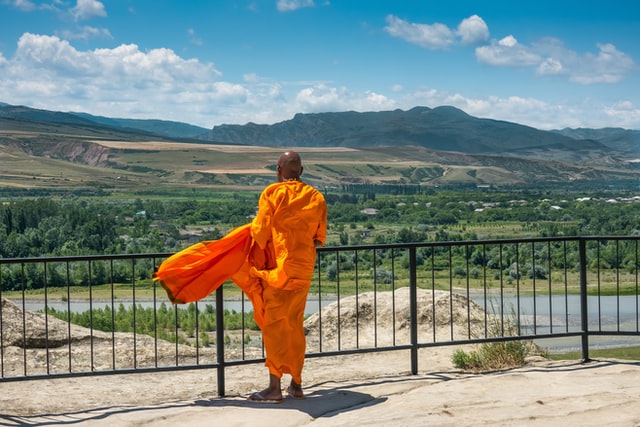 colour orange on a monk